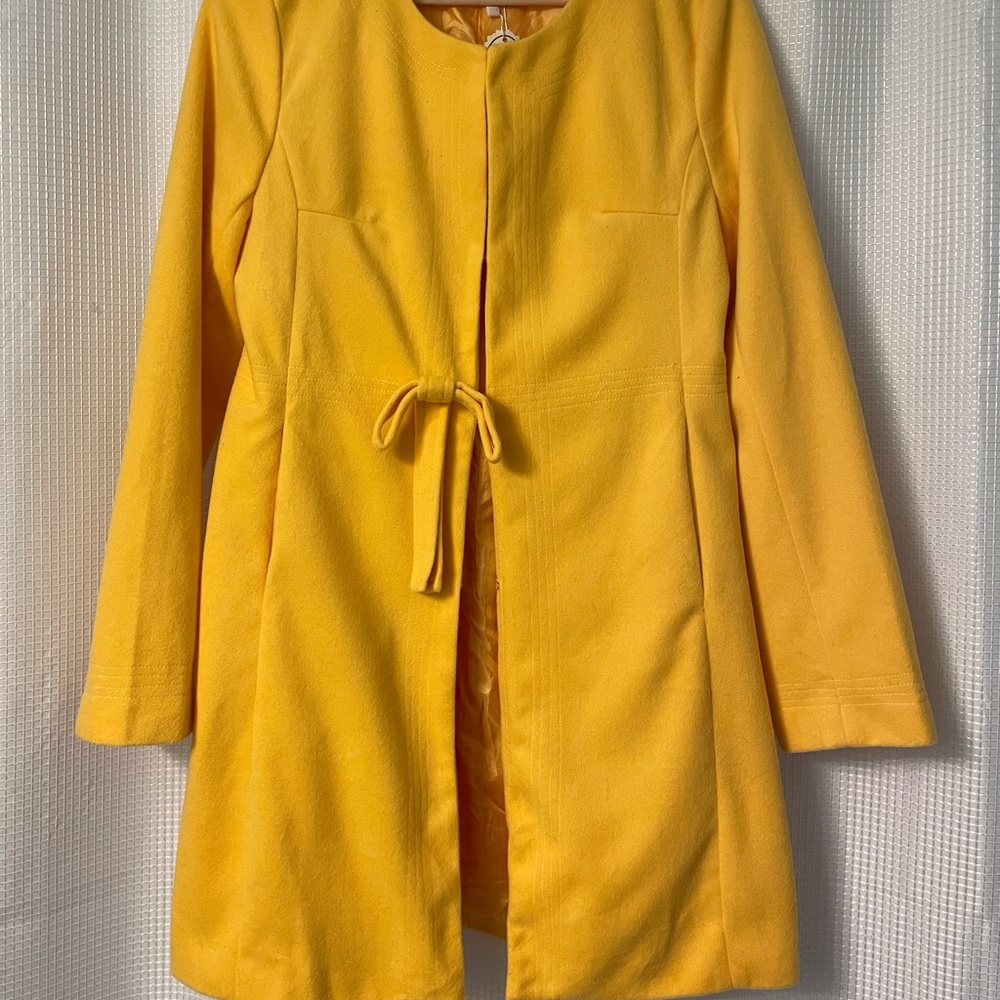 Tunic length spring jacket in a beautiful bright daffodil yellow.